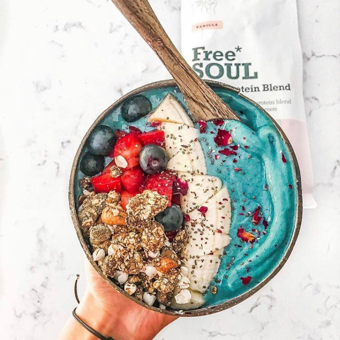 Free Soul smoothie bowl topped with banana, strawberries, blyeberries and clusters