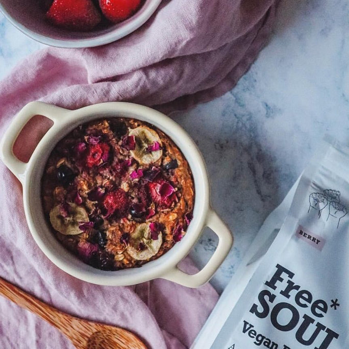 Baked oatmeal with free soul vegan protein powder bag in the bottom right corner