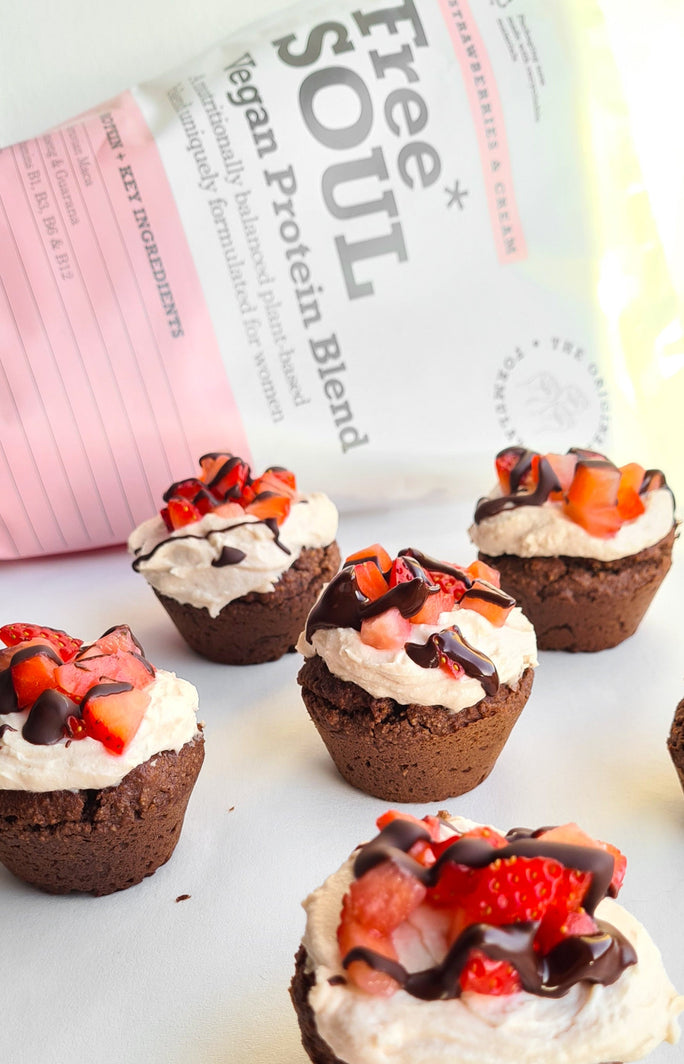 Strawberries & cream muffins in front of Free Soul vegan protein powder packaging