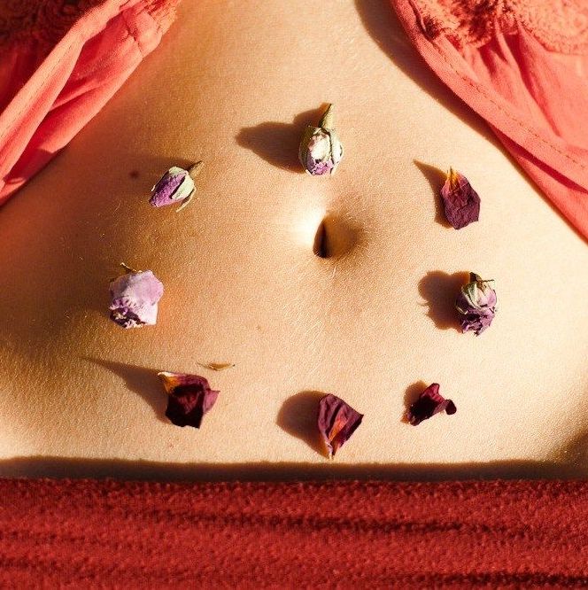 flowers on a women's stomach
