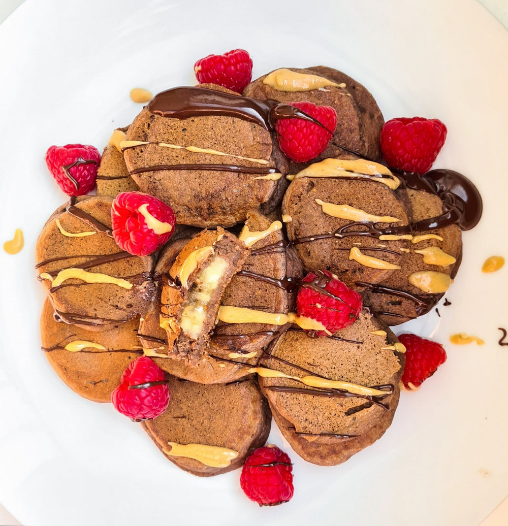A pile of protein cookies with a cream filling