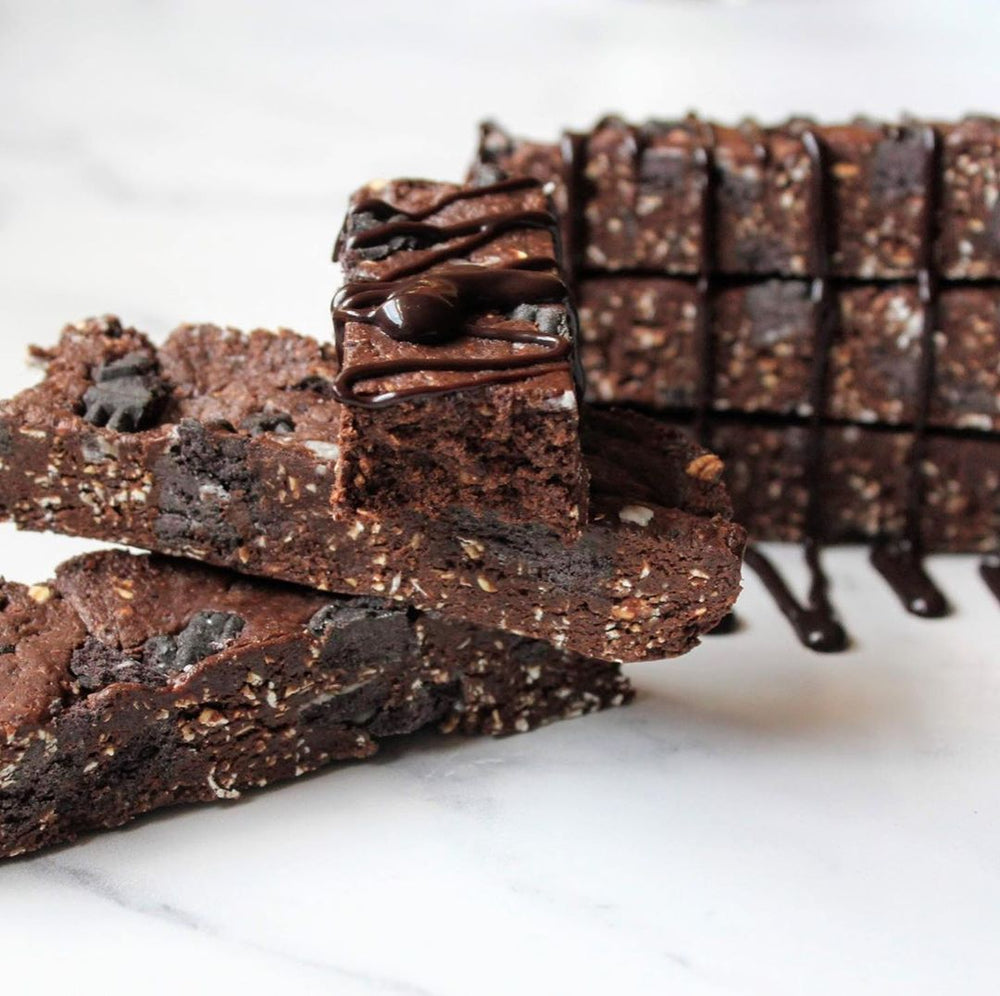 Close up of chocolate protein bars with chocolate drizzle